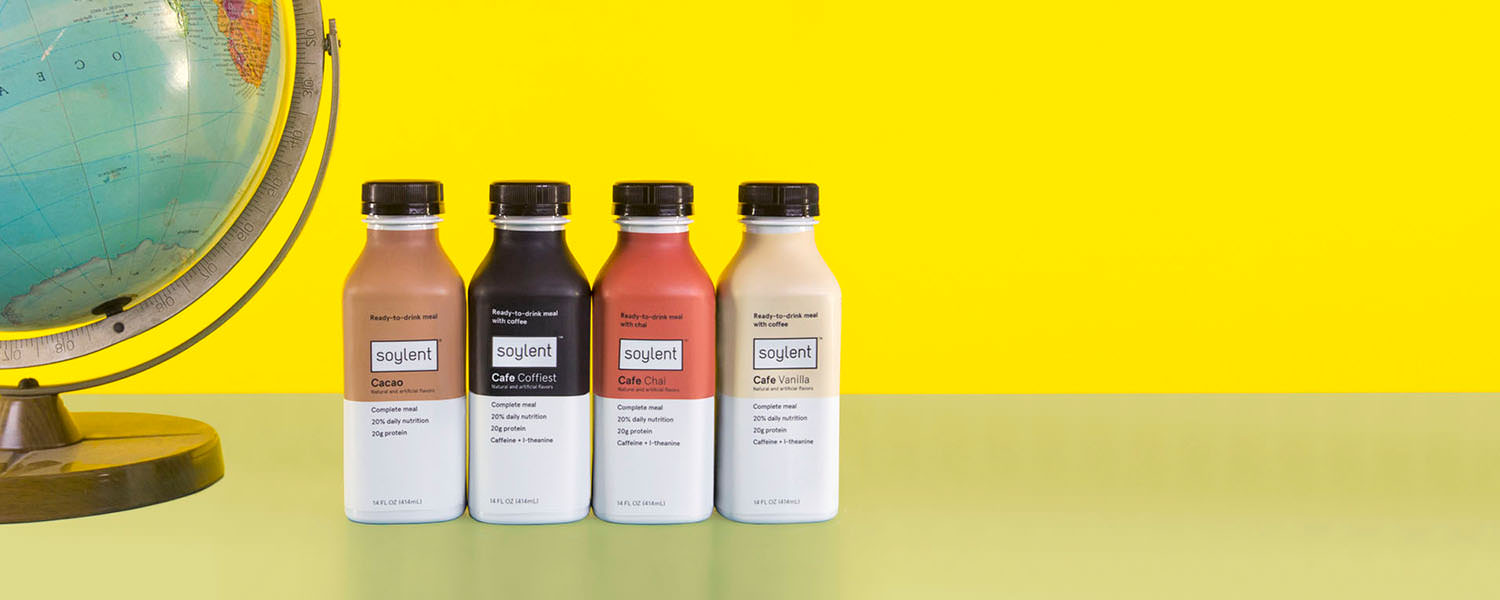 Soylent Meal Replacement Shakes with standing globe